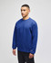 A blue Champion Powerblend® adult crewneck sweatshirt displayed on a model standing against a plain background.