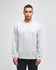 A grey crewneck sweatshirt displayed on a model, featuring a logo on one sleeve.