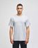 A grey adult short-sleeve t-shirt. The shirt features a logo on one sleeve.