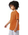 An orange short sleeve t-shirt for youth, featuring a logo on the sleeve.