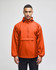 An orange packable anorak jacket with a hood and a front pocket, featuring a logo on the chest.