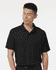 A black Men's Pro-Lock Performance Polo with a collared design and a branded logo.