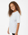 A youth performance t-shirt in white, featuring a relaxed fit and short sleeves, displayed on a smiling child.