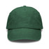 A vintage washed cap in deep green with an adjustable strap and a logo on the front.