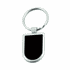 A silver keychain with a smooth, rectangular black surface for custom engraving.