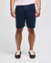 Navy cotton gym shorts with an elastic waistband and a logo, modelled by a person standing upright.