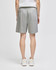 Grey cotton gym shorts with an elastic waistband and a logo, viewed from the back.