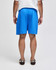 Blue cotton gym shorts with an elastic waistband, featuring a logo on the side.