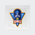 A sticker featuring a space shuttle design with blue, yellow, and red colours, labelled "Space Camp" and a logo.