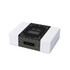 A gift box featuring a black and white patterned design, wrapped with a decorative band.