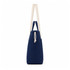 A navy tote bag with cream handles and a drawstring closure, featuring a subtle logo.