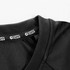 A black Swiss Peak Urban Unisex T-Shirt featuring a textured fabric and a branding label on the collar.