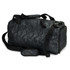 A duffle bag in urban camo pattern featuring black and dark green tones, with a shoulder strap and handles.