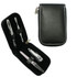 A black manicure set featuring stainless steel tools including nail clippers and tweezers, in a zippered case.