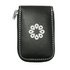 A black manicure set pouch with a circular logo design and a zip closure.