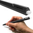 A black plastic pen with a white tip, held in a hand. The pen features a sleek design and has a logo.