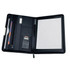 A black A4 zip compendium featuring a calculator, pen holder, card slots, and lined notepaper.