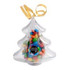 Acrylic tree-shaped container filled with colourful M&Ms, adorned with a gold ribbon and a branded sticker.