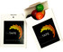 A cardboard box in white with a logo, containing colourful Skittles in red, green, yellow, and orange.