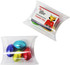 A clear pillow pack containing four solid chocolate Easter eggs in blue, green, red, and gold foil.
