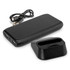 A black wireless charging station with a removable dock and USB cable. Features multiple USB ports for device charging.