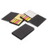 A black sticky note book featuring multicoloured sticky notes, including yellow, pink, and orange, alongside blank notes.