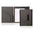 A black A5 folder with magnetic closure, featuring a notepad and a pen, alongside an interior pocket.