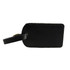 A black luggage tag with a leather finish and a strap for attachment. It has a minimalistic design.