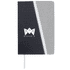 A notebook featuring a grey and black cover with a logo and a white geometric design. It includes a ribbon bookmark.