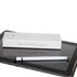 A metal pen in white with a silver band, placed beside a box labelled "infinity pen" on a tablet.