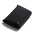 A black toiletry bag with a zip closure and a small logo. It features a sleek, minimalist design.
