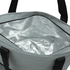 A grey cooler bag with a silver insulated interior and black handles, featuring a zip closure.