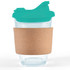 A reusable coffee cup featuring a clear body, a teal snap lid, and a cork band around the middle.