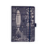 A dark blue A5 notebook with decorative white illustrations, featuring a logo on the cover.