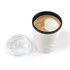 A reusable coffee cup in white with a black lid, featuring a latte art design on top.