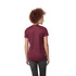 A woman wearing a short sleeve tech tee in burgundy, viewed from the back, featuring a logo.