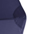 A close-up of the corner of a navy blue vented tipless golf umbrella featuring a structured design.