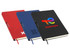 A set of three A5 notebooks in red, blue, and black, each featuring a logo on the cover and a ribbon bookmark.