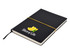 A black A5 notepad with a yellow elastic band and a logo featuring a slice of citrus on the cover.