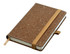 A brown bonded leather A6 notebook with an elastic band and a ribbon bookmark. It has a textured surface.