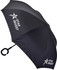 An inverted black umbrella with a C-shaped handle and a logo printed on one side.