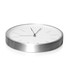 A wall clock featuring a sleek aluminium frame and a white face with minimalist hour markers and hands.