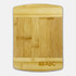 A bamboo cutting board featuring a smooth surface with a rectangular shape and a small logo on one side.
