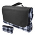 A black and white checkered picnic blanket, folded with a carrying handle. It features a sleek black exterior.