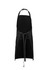 A black apron with adjustable straps, featuring pockets and a tied waist. It has a simple, modern design.