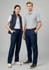 A pair of women's navy slacks displayed on a model, featuring a slim fit with a smooth finish.
