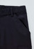 A close-up of black men's comfort waist cargo pants featuring side pockets and a sturdy waistband.