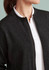 A zip-front jumper in black, featuring a high collar and a textured fabric design. It has a logo on the side.