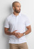 A white short sleeve polo shirt is worn by a man standing against a neutral background, featuring a subtle logo.
