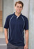 A navy short sleeve polo shirt with light blue accents and a logo. Model is standing with a casual pose.